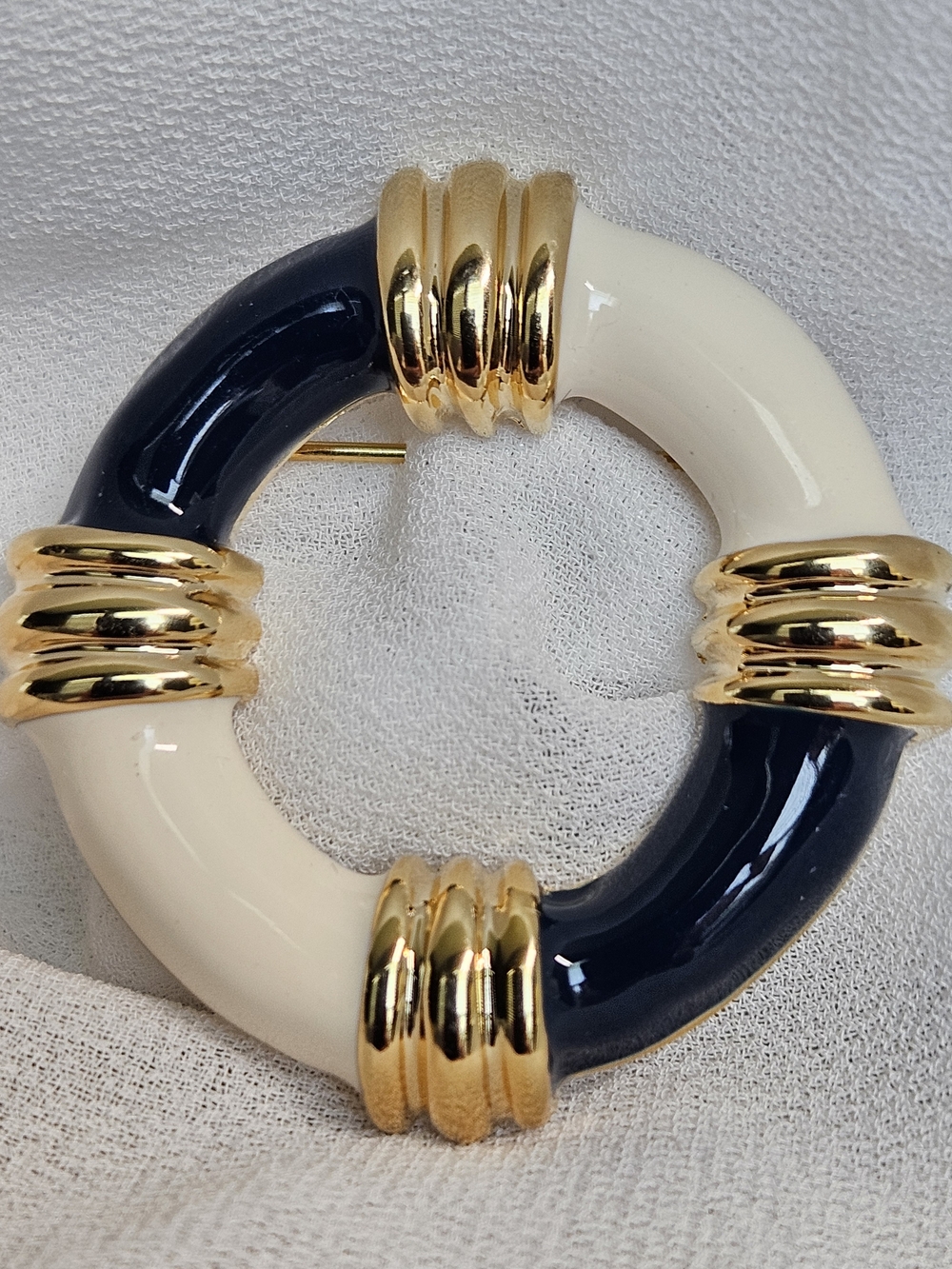 Stylish Two-Tone Navy and Cream Hoop Brooch with Gold Accents